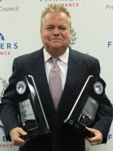 dunphy insurance services man with awards